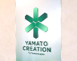 Yamato Creation signage and logo